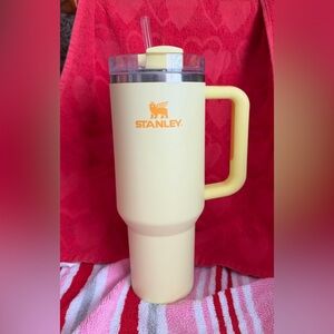 40oz yellow Stanley with orange detail